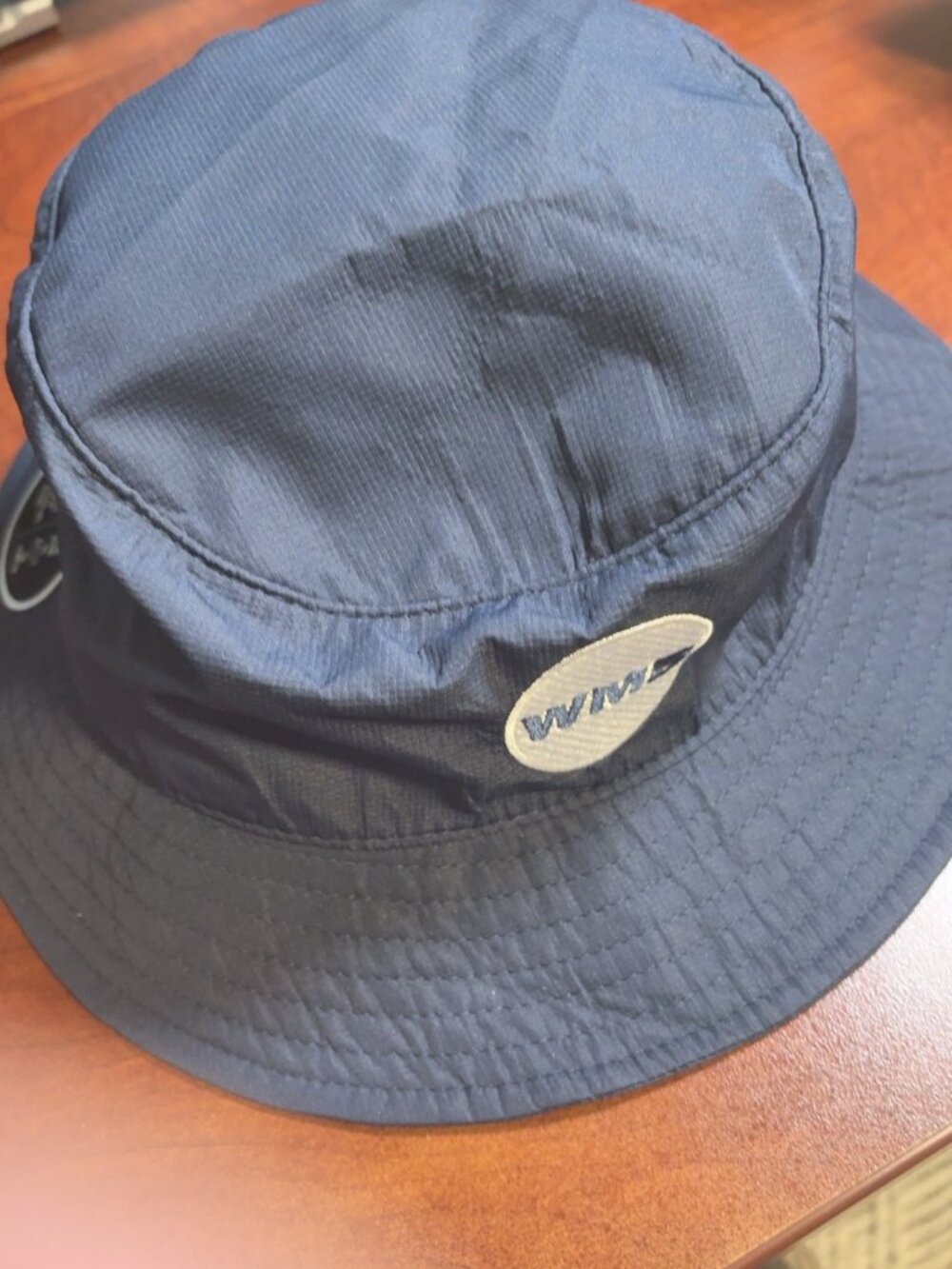 AJM International UPF50+ Navy Performance Bucket Hat Embroidered Logo